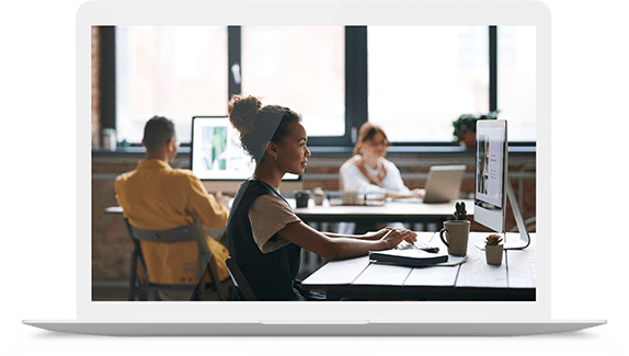 People working at computers in modern office
